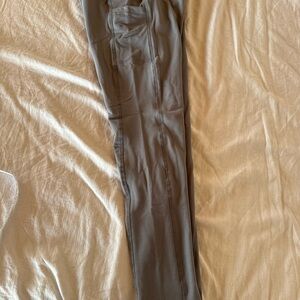 2 pairs of Women's Gray and Navy Fleeced lined Leggings. New in package